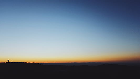 silhouette photo of tree during sunset thumbnail