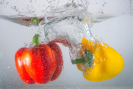 two red and yellow bell peppers thumbnail