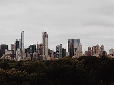 high-rise building under nimbus clouds thumbnail