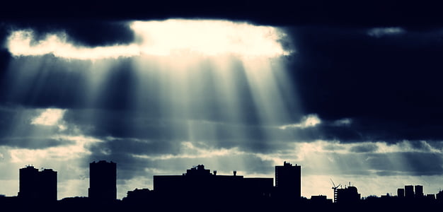 sun rays over city thumbnail
