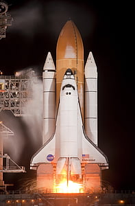 lunching Nasa Space shuttle during night time thumbnail
