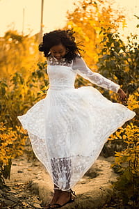 Woman Wearing White Dress thumbnail