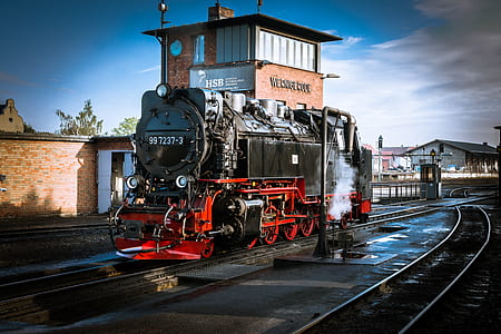 red and black steam train thumbnail