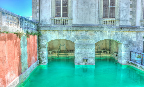 in-ground pool inside building during daytime thumbnail