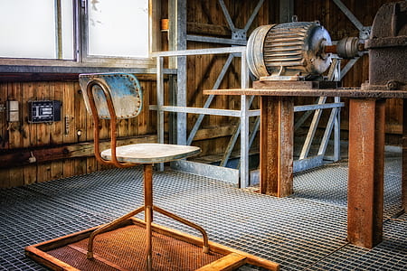 beige and brown chair in front of AC motor thumbnail