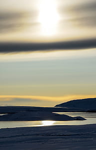 island across body of water thumbnail