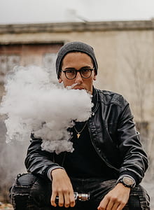 man in black leather jacket vaping thumbnail