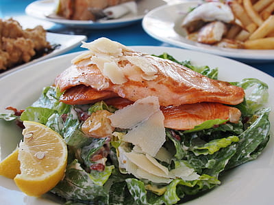 salmon with vegetable salad garnish dish on white plate thumbnail