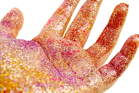 glitters on human left palm thumbnail