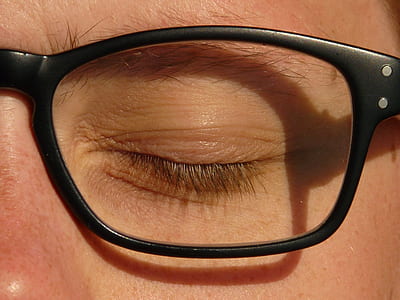 person wearing black framed eye glasses thumbnail