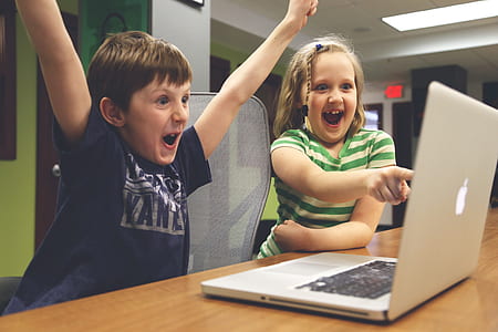 boy and girl on top of table playing thumbnail