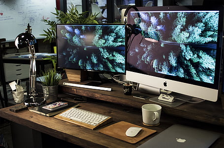 two turned on monitors thumbnail