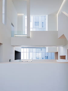 white concrete building inside the room thumbnail