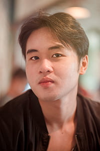 Close Up Photo of Man Wearing Black Shirt thumbnail