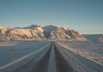 road and mountain during daytime thumbnail