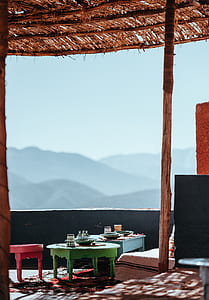 green, red, and blue wooden tables thumbnail
