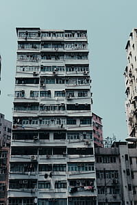 white concrete building under blue sky at daytime thumbnail