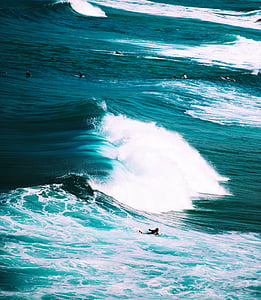 aerial view photography of person surfing on sea waves thumbnail