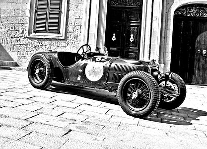 grayscale photo of vintage car thumbnail