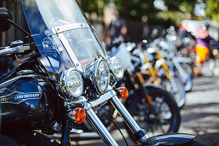 parked blue Harley-Davidson touring motorcycle during daytime thumbnail