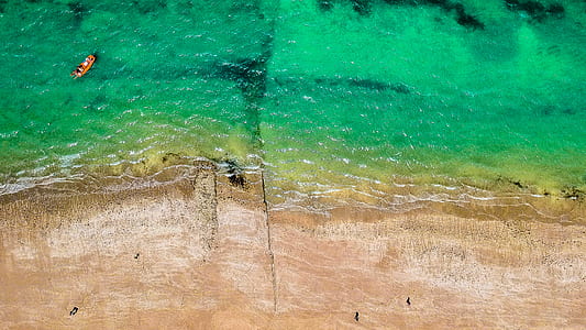 aerial photography of white sand beach thumbnail