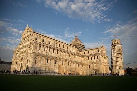 Pisa Cathedral with the Leaning Tower of Pisa in sunlight thumbnail