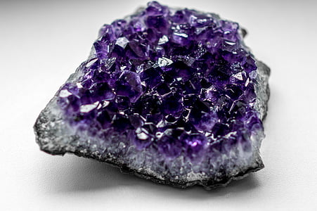 purple geode on white table top thumbnail