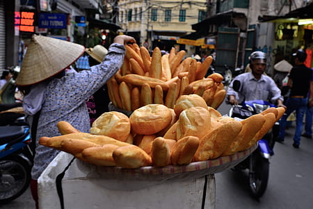 woman selling breads on basket thumbnail