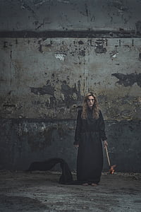 woman holding wooden torch thumbnail