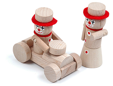 two brown wooden toys with white background thumbnail