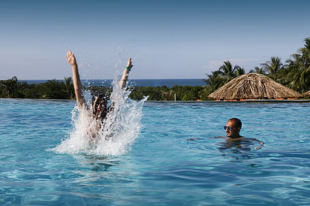 woman and man on swimming pool thumbnail