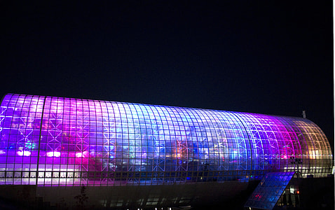 Crystal Bridge museum with lights turned on at night thumbnail