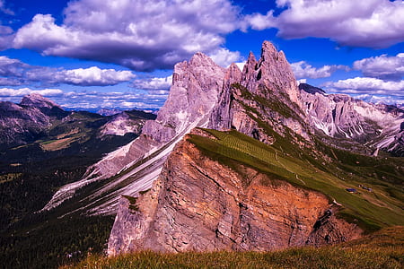 bird's-eye landscape photography of mountain range under nimbus clouds and blue calm sky thumbnail