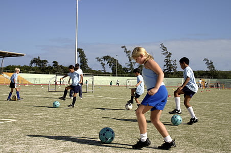 woman playing soccer thumbnail