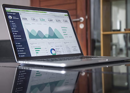 silver laptop computer showing graph thumbnail