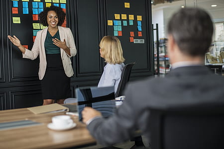 woman standing front of man thumbnail