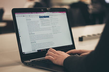 person using black laptop computer thumbnail