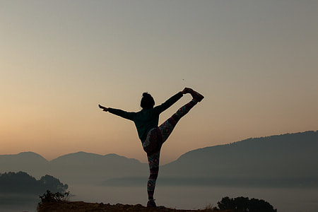 person doing stretching during golden hour thumbnail
