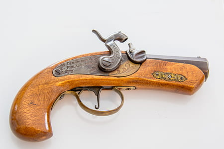 brown and gray flintlock pistol thumbnail