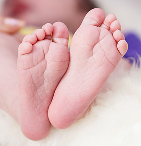 selective focus photography of baby's feet thumbnail
