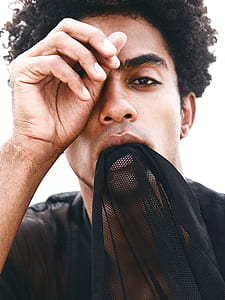 man biting his shirt thumbnail