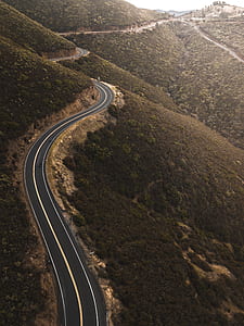 black asphalt road during daytime thumbnail