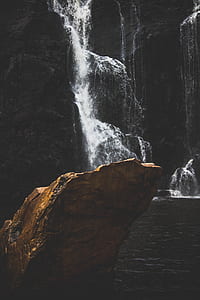 stone formation near waterfalls thumbnail