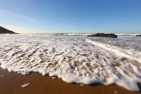 blue ocean with background of rocks thumbnail