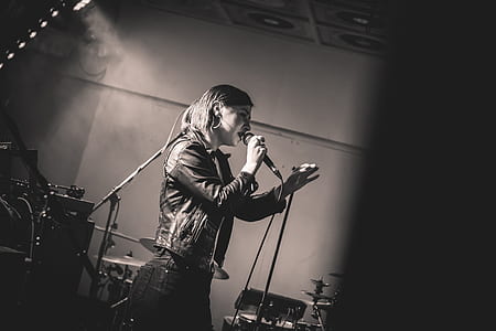 graysacled photo of woman singing thumbnail