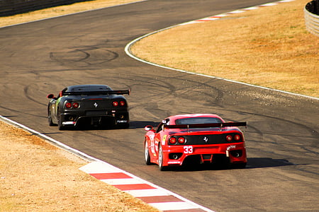 red and black sports car thumbnail