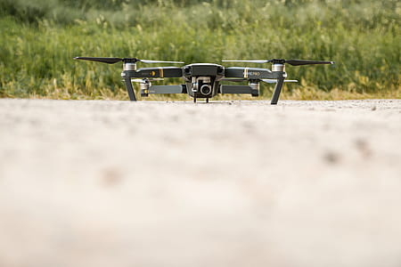 Modern drone on the ground and ready to fly thumbnail