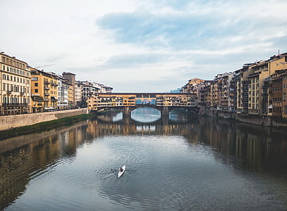 Ponte Vecchio, a medieval stone closed-spandrel segmental arch bridge over the Arno River in Florence, Italy thumbnail