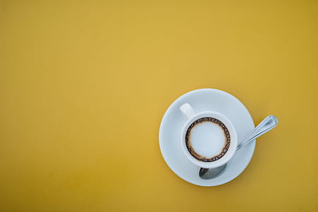 white ceramic cup with white and brown liquid thumbnail