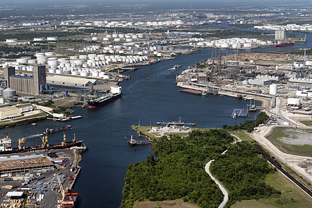 aerial photo of city and body of water during daytime thumbnail